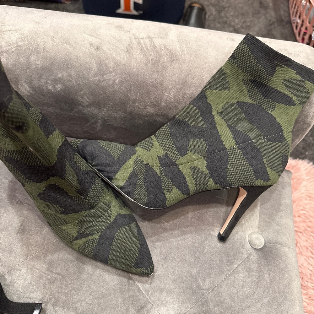 Camouflage stretch heeled bootie.